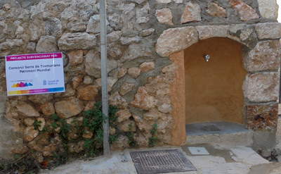 Restauració d'un marge i d'una font